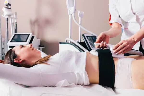 woman having body sculpting to help improve her body image and her mental health Greater London (Kingston upon Thames)